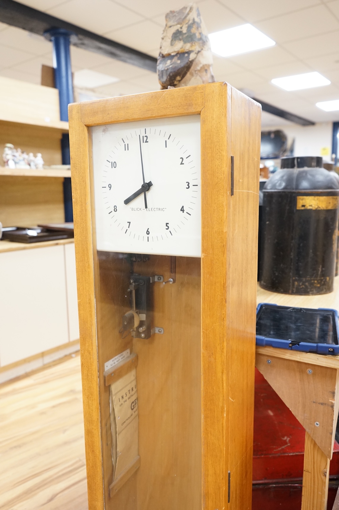A floor standing Blick-Electric synchrome master clock, 128.5cm high x 29cm wide